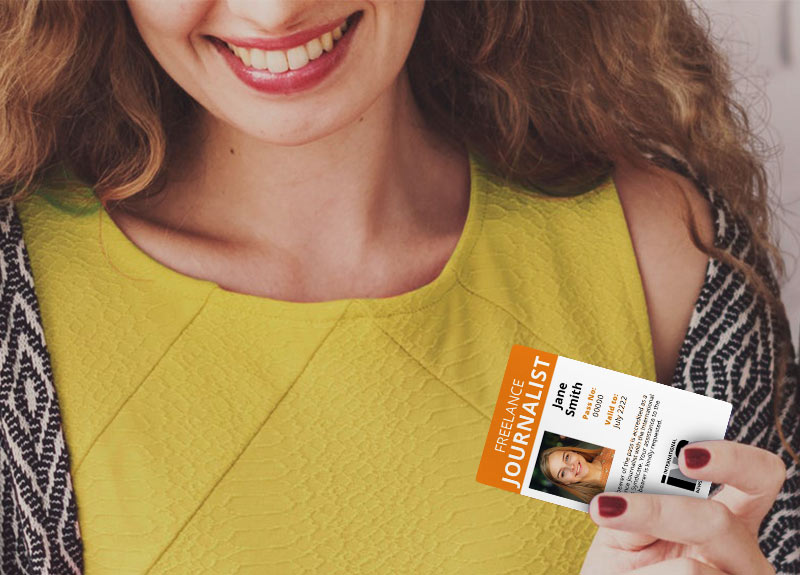 Online professional freelance journalism student holding an ID